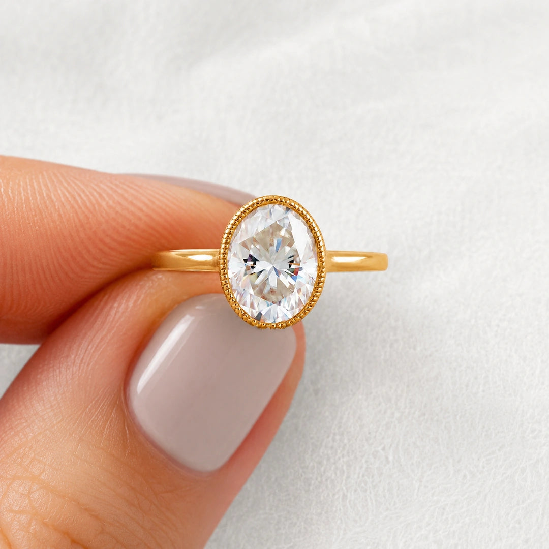 Elongated Oval Diamond Bezel Set Engagement Ring