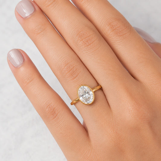 Oval Diamond Bezel Solitaire Ring in 14K Yellow Gold