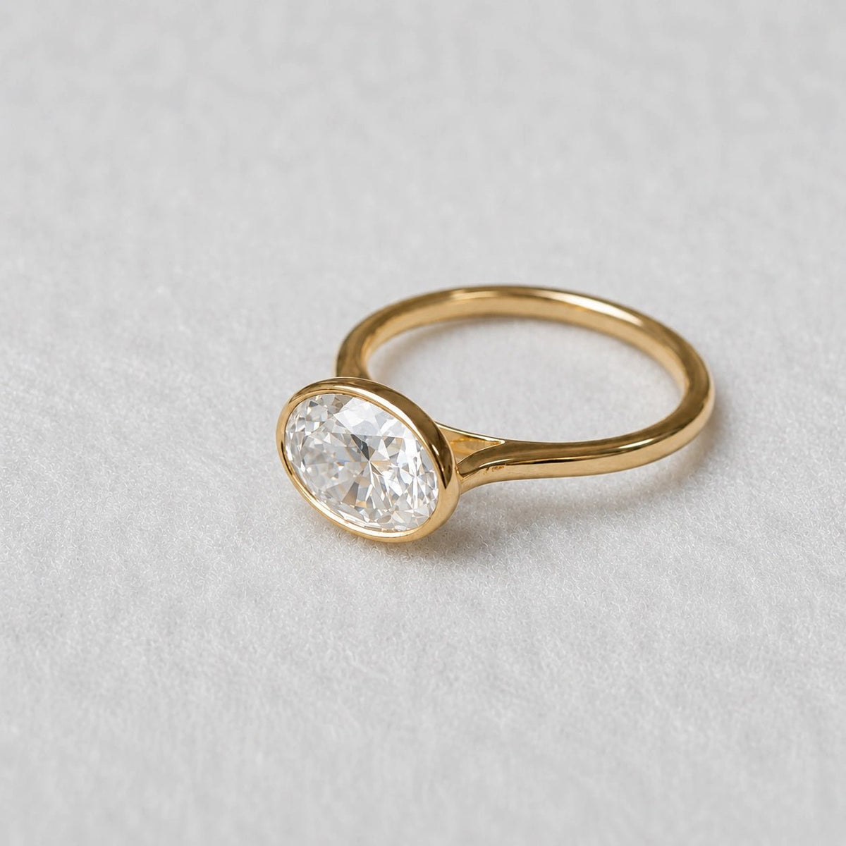 2 Ct East West Oval Bezel Lab Grown Diamond Engagement Ring in 14K Yellow Gold - Riant Fine Jewelry LLC
