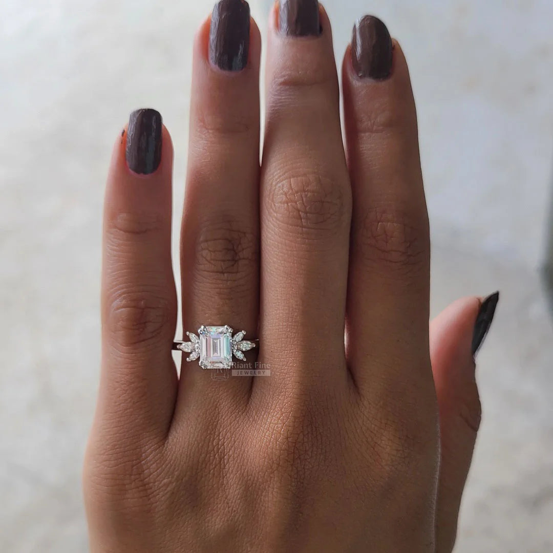 Emerald-Lab-Diamond-Cluster-Engagement-Ring-on-Hand