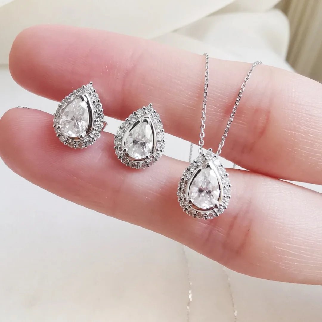 Halo Pear Shaped Moissanite Pendant In 14K Gold - Riant Fine Jewelry