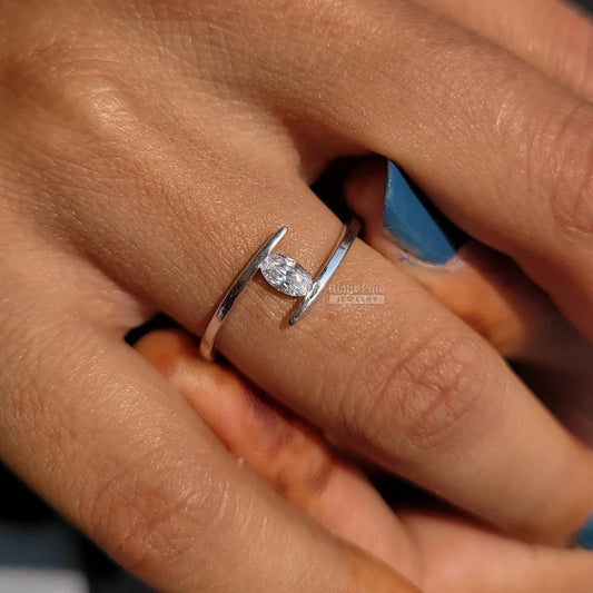 Tension Set Oval Diamond Engagement Ring In 14K Gold - Riant Fine Jewelry