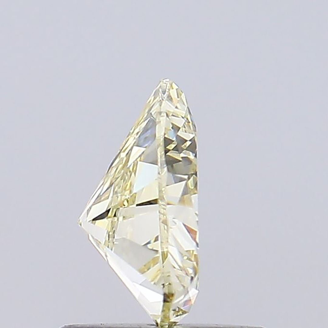 0.91 Ct Fancy Light Yellow Triangle Lab Grown Diamond - Riant Fine Jewelry