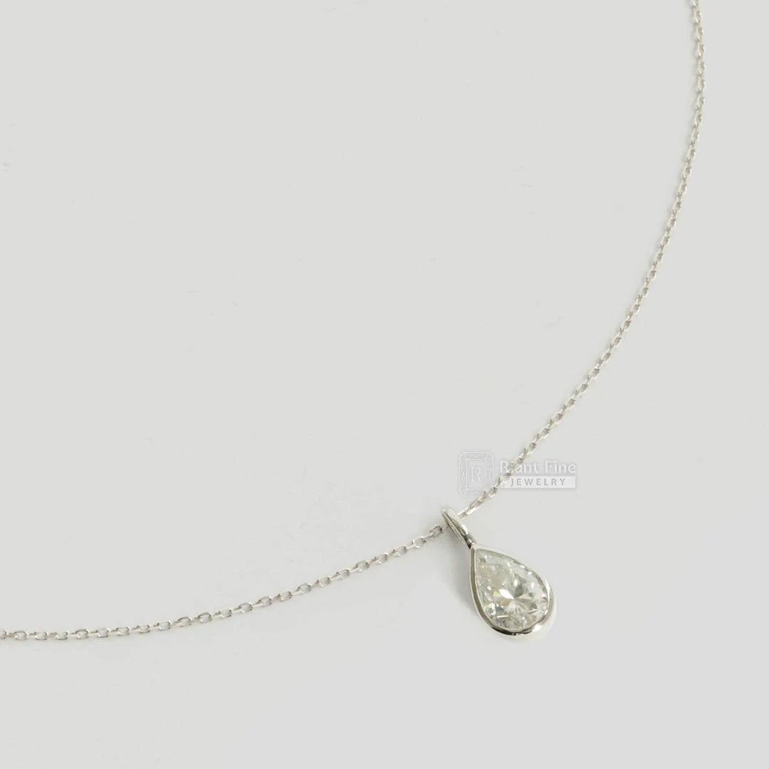 1.2 Ct Bezel Pear Cut Colorless Moissanite Pendant - Riant Fine Jewelry