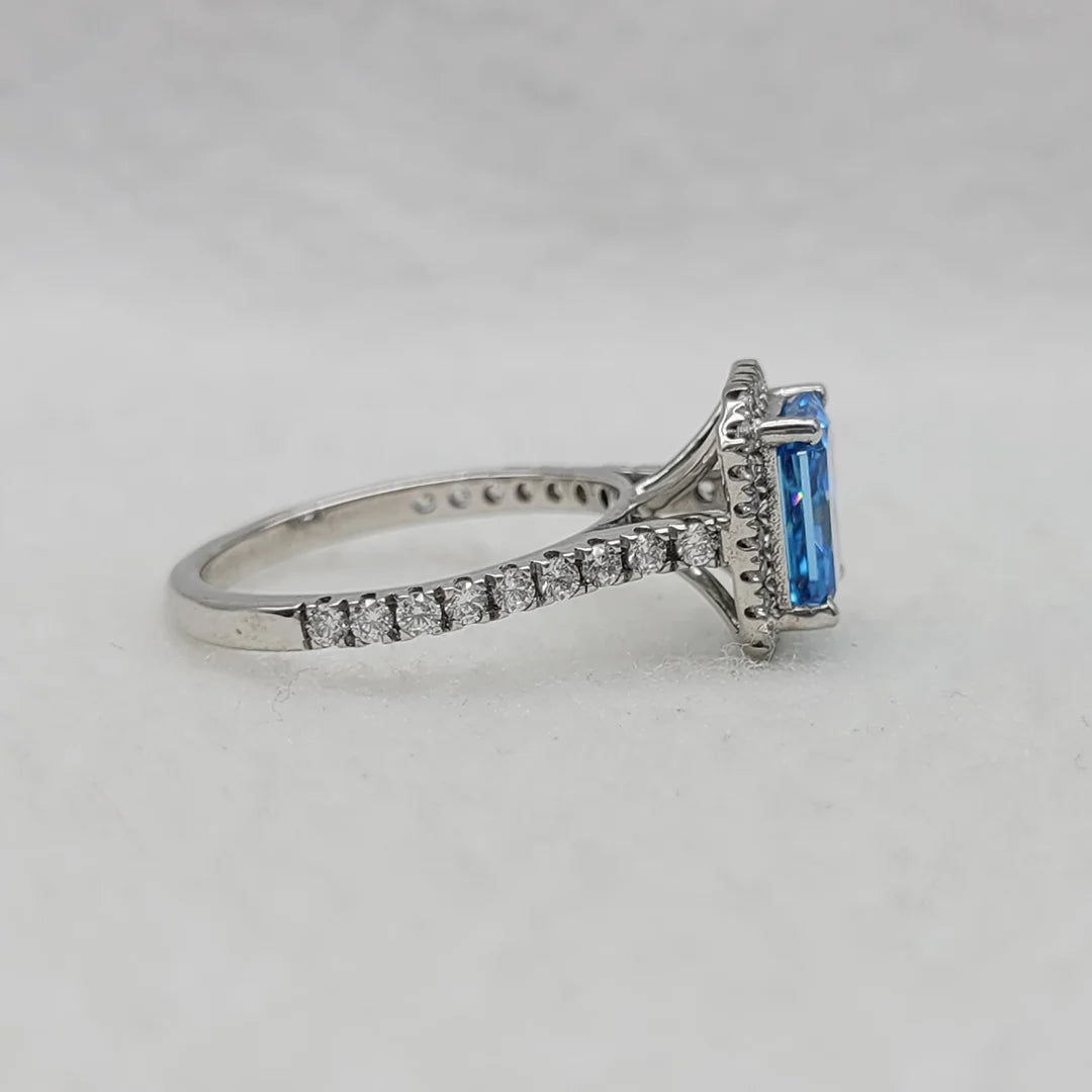 2.5 carat emerald cut blue sapphire engagement ring