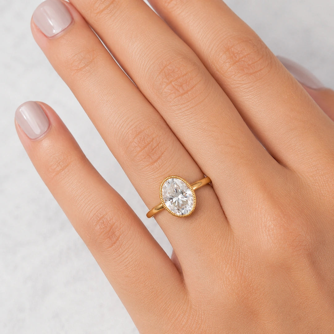 Oval Diamond Bezel Solitaire Ring in 14K Yellow Gold