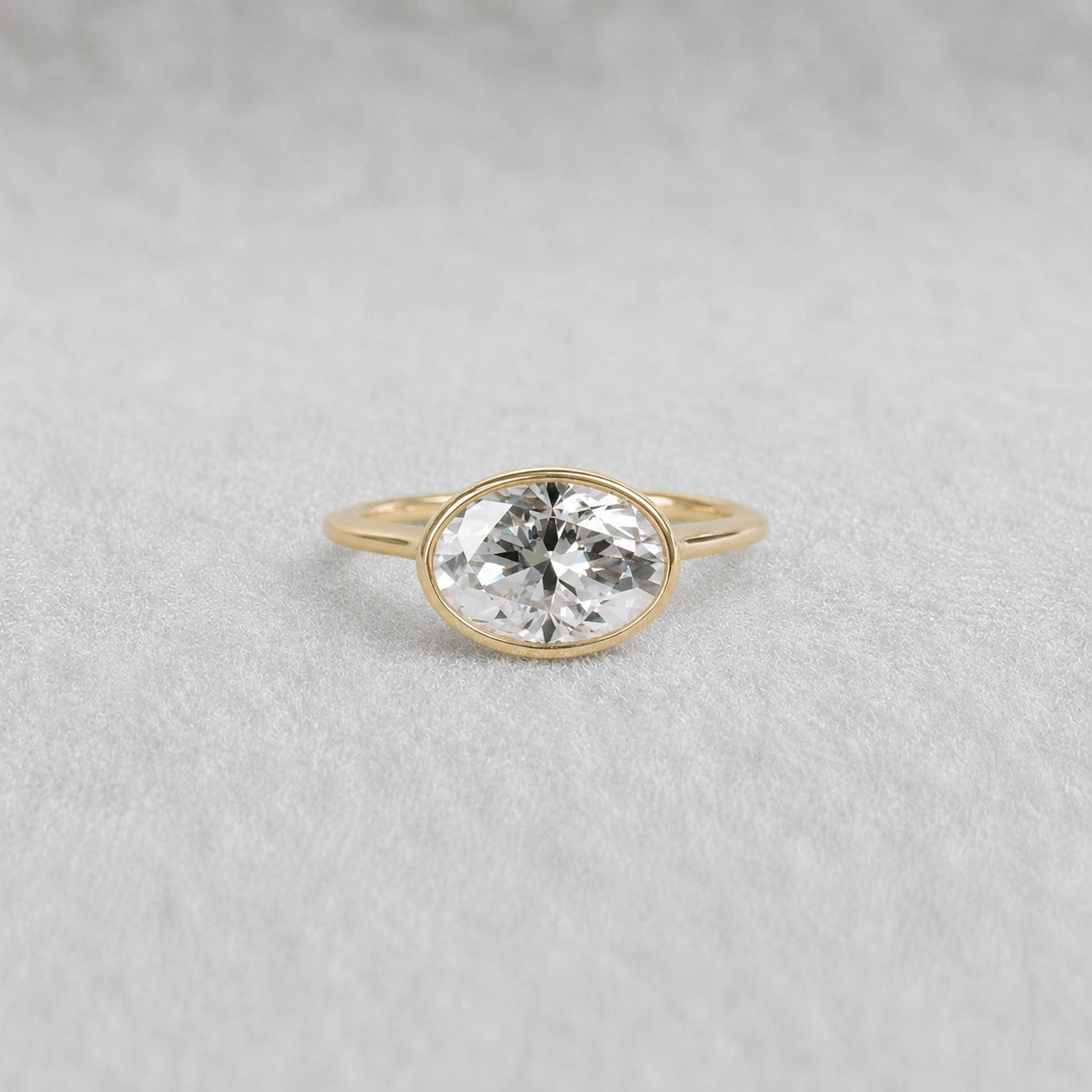 2 Ct East West Oval Bezel Lab Grown Diamond Engagement Ring in 14K Yellow Gold - Riant Fine Jewelry LLC