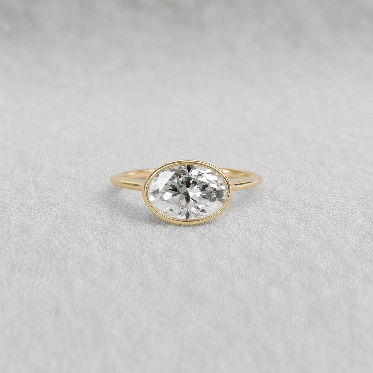 2 Ct East West Oval Bezel Lab Grown Diamond Engagement Ring in 14K Yellow Gold - Riant Fine Jewelry LLC