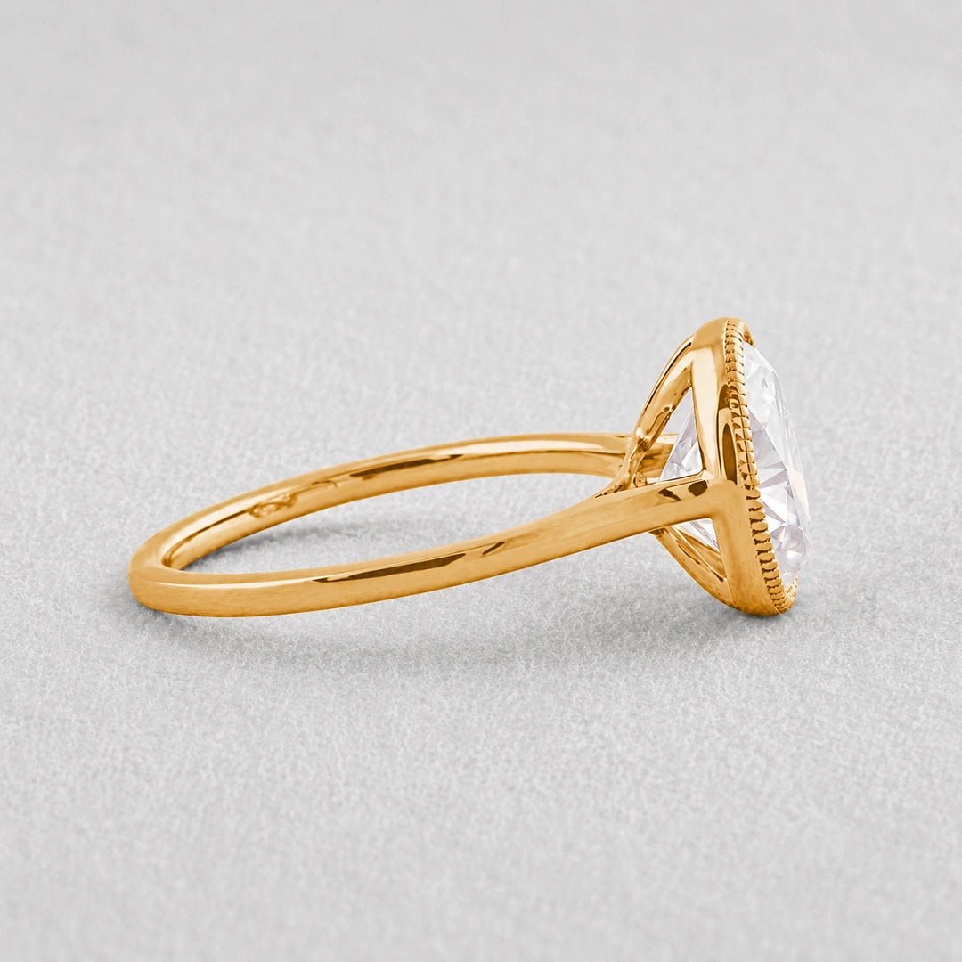 2.5 Ct Oval Lab Grown Diamond Bezel Engagement Ring in 14K Yellow Gold - Riant Fine Jewelry LLC