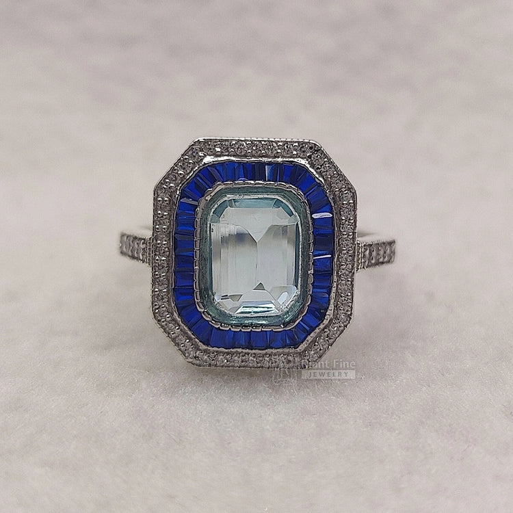 emerald-cut-aquamarine-engagement-ring