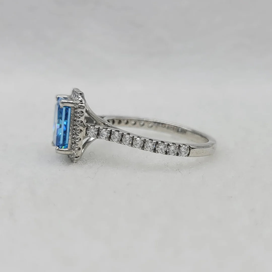 14K white gold emerald cut blue sapphire ring