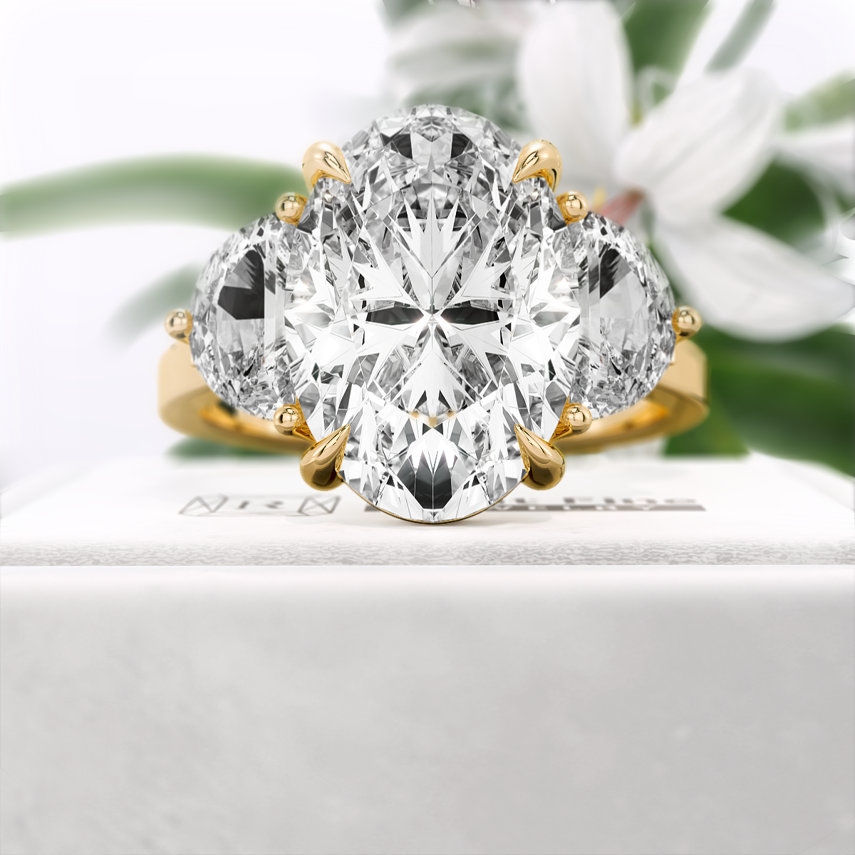 Oval-Cut-Moissanite-Three-Stone-Engagement-Ring-Gold-Front-View