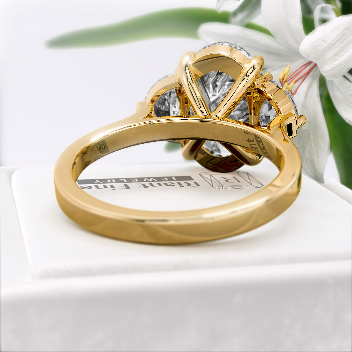 Oval-Cut-Moissanite-Three-Stone-Engagement-Ring-Gold-Back-View