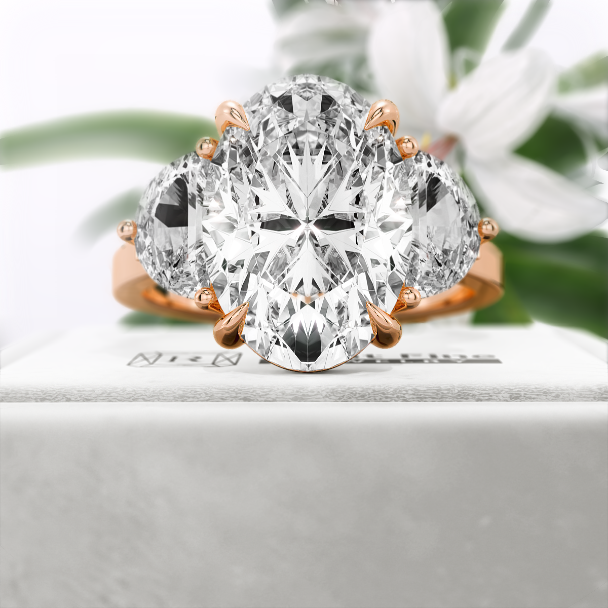 Oval-Cut-Moissanite-Three-Stone-Engagement-Ring-Rose-Gold-Front-View