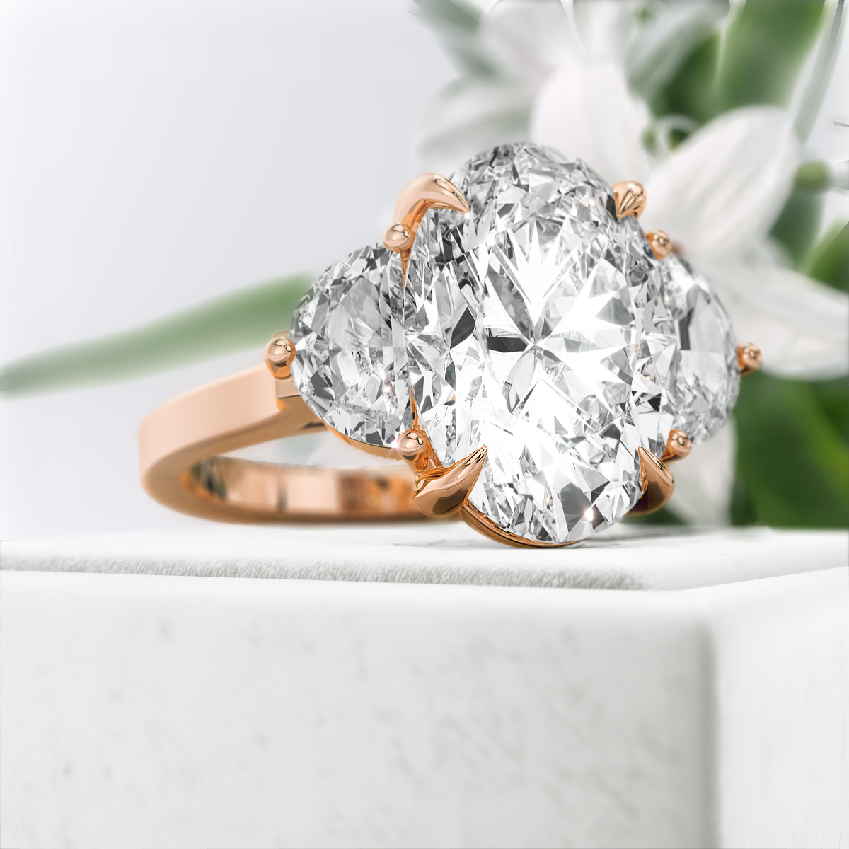 Oval-Cut-Moissanite-Three-Stone-Engagement-Ring-Rose-Gold-Diamond-View