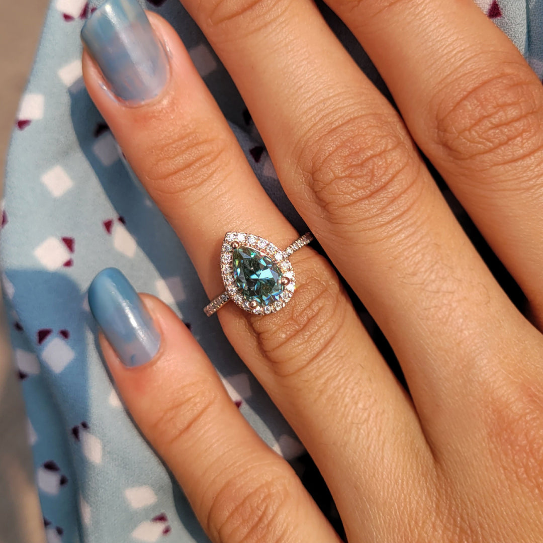 Pear Cut Blue Moissanite Ring in 14K Rose Gold