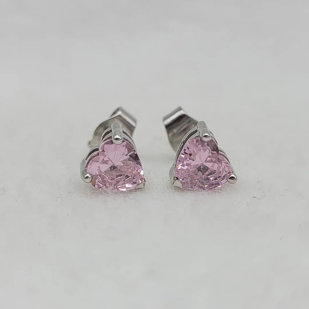 Pink sapphire heart stud earrings in 925 sterling silver