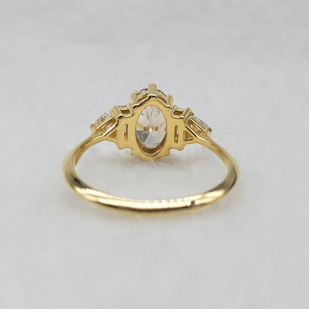 Champagne Oval Diamond Ring with Baguette Side Stones