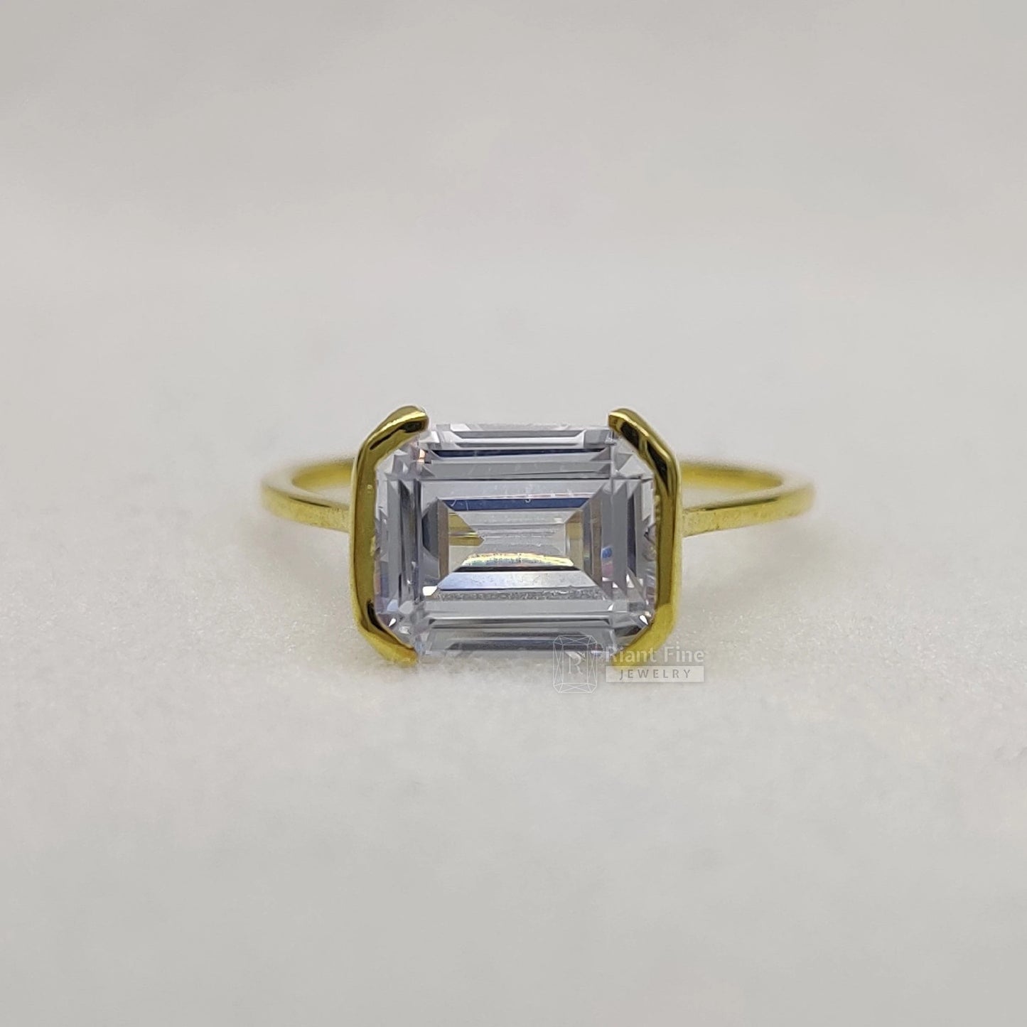 east west emerald lab diamond engagement rings