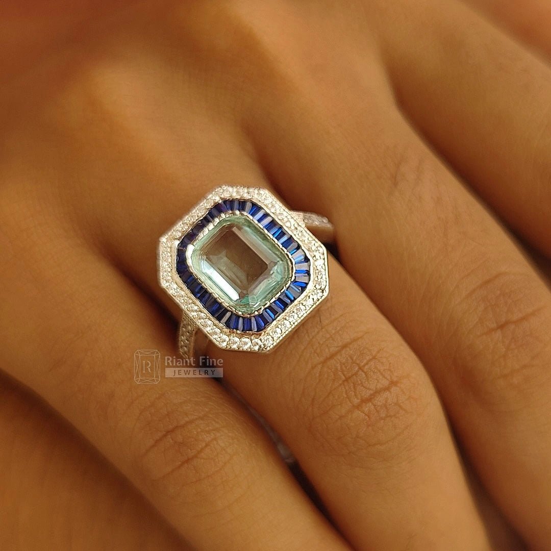 Emerald Cut Aquamarine Halo Engagement Ring in 14K Gold - Riant Fine Jewelry