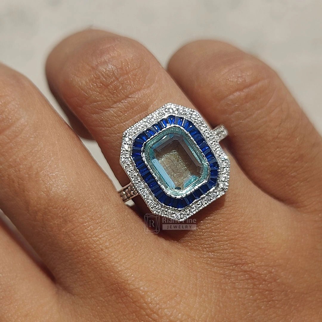 Emerald Cut Aquamarine Halo Engagement Ring in 14K Gold - Riant Fine Jewelry