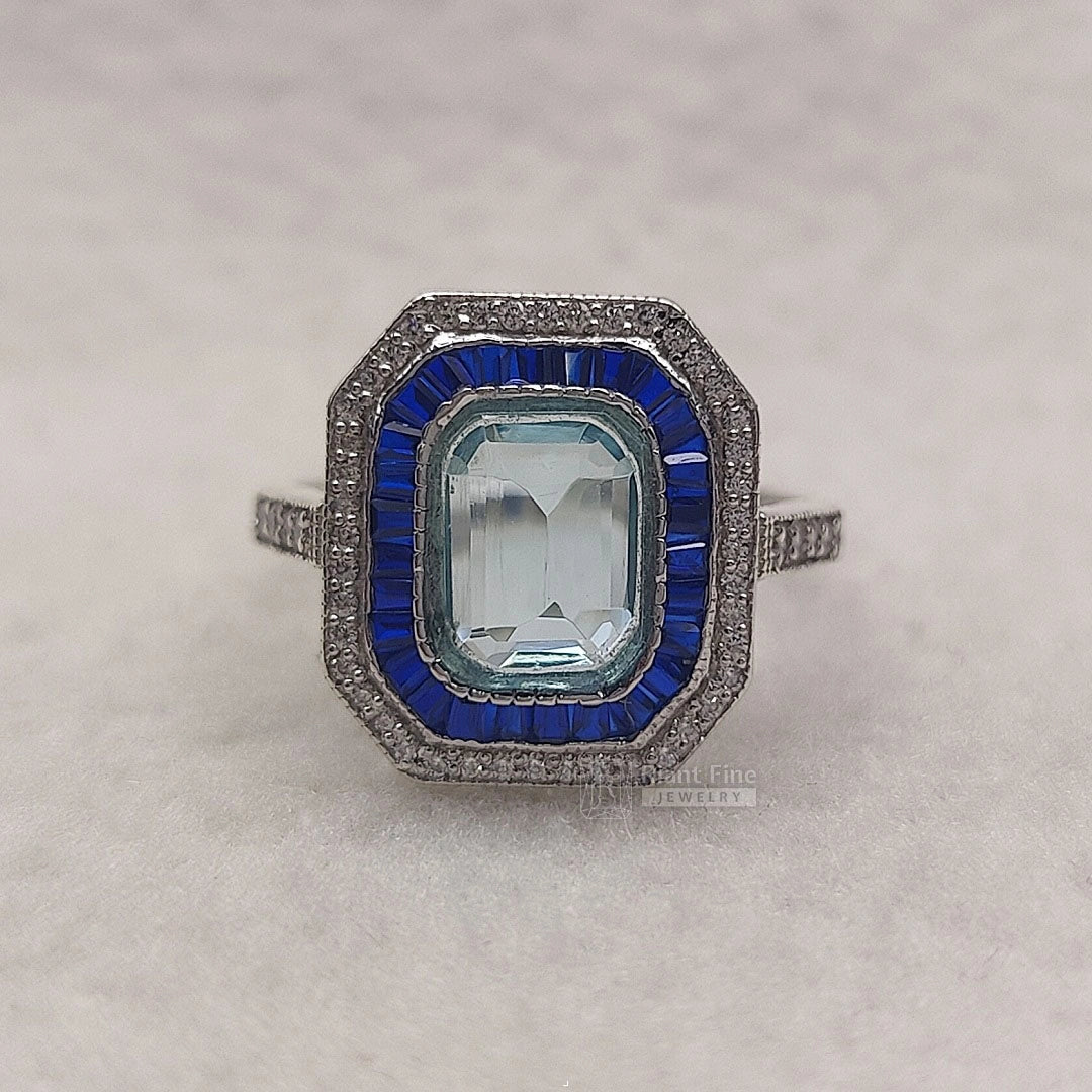 Emerald Cut Aquamarine Halo Engagement Ring in 14K Gold - Riant Fine Jewelry