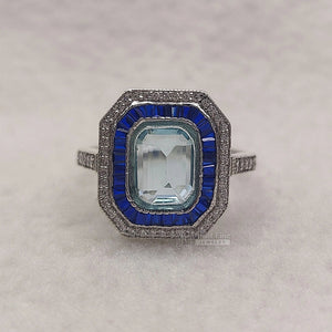 Emerald Cut Aquamarine Halo Engagement Ring in 14K Gold