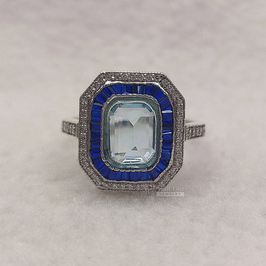 Emerald Cut Aquamarine Halo Engagement Ring in 14K Gold - Riant Fine Jewelry