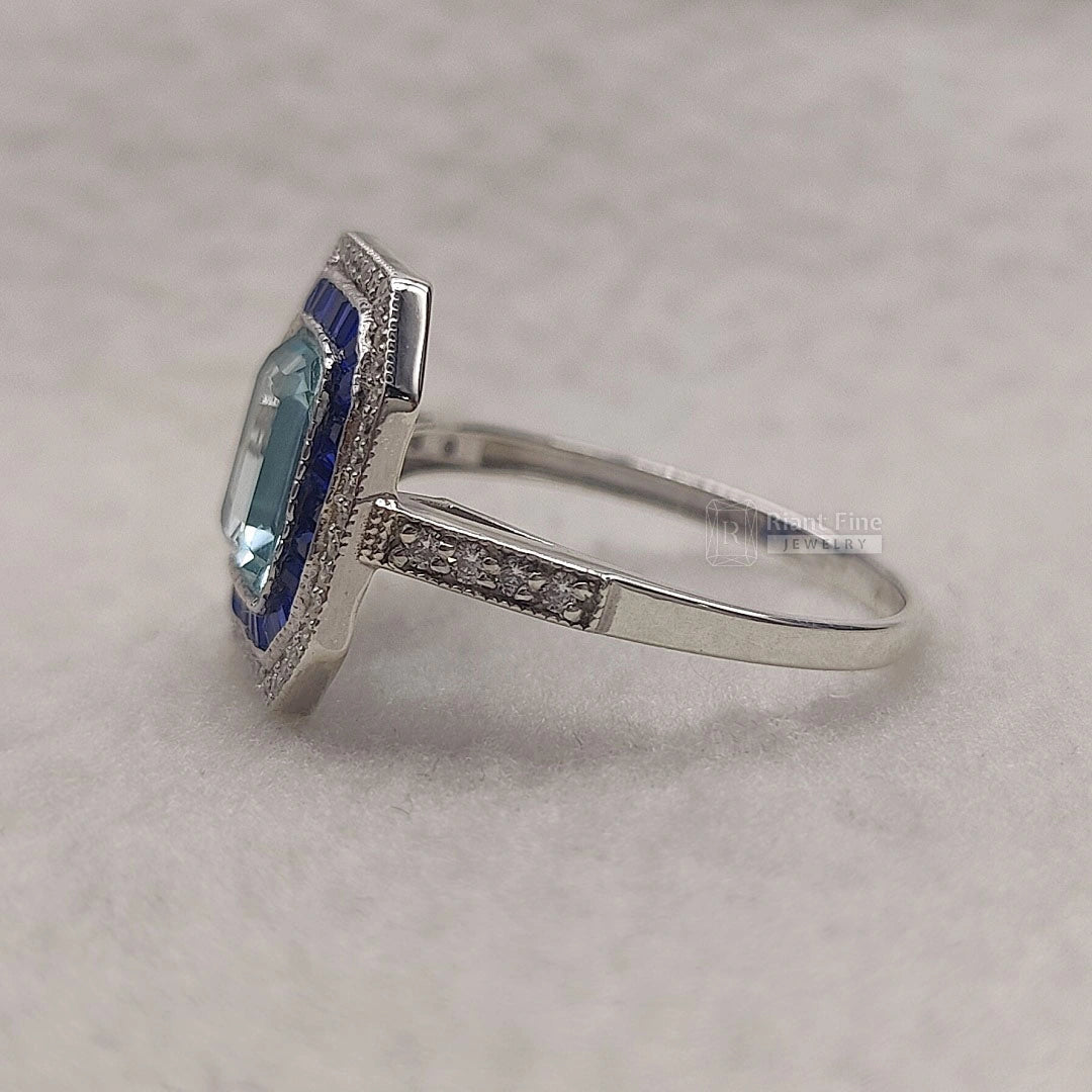 Emerald Cut Aquamarine Halo Engagement Ring in 14K Gold - Riant Fine Jewelry