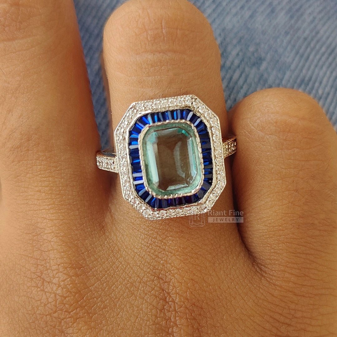 Emerald Cut Aquamarine Halo Engagement Ring in 14K Gold - Riant Fine Jewelry