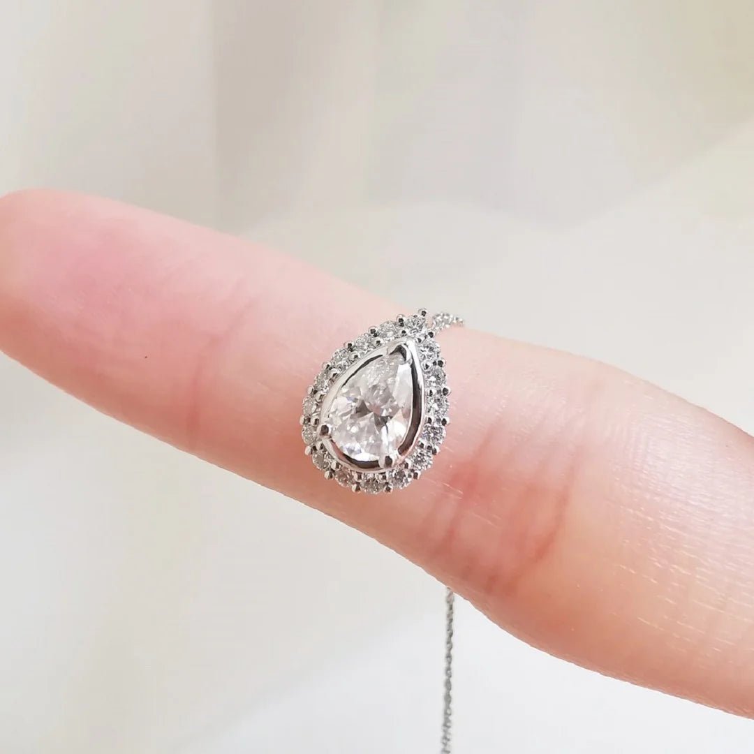 Halo Pear Shaped Moissanite Pendant In 14K Gold - Riant Fine Jewelry