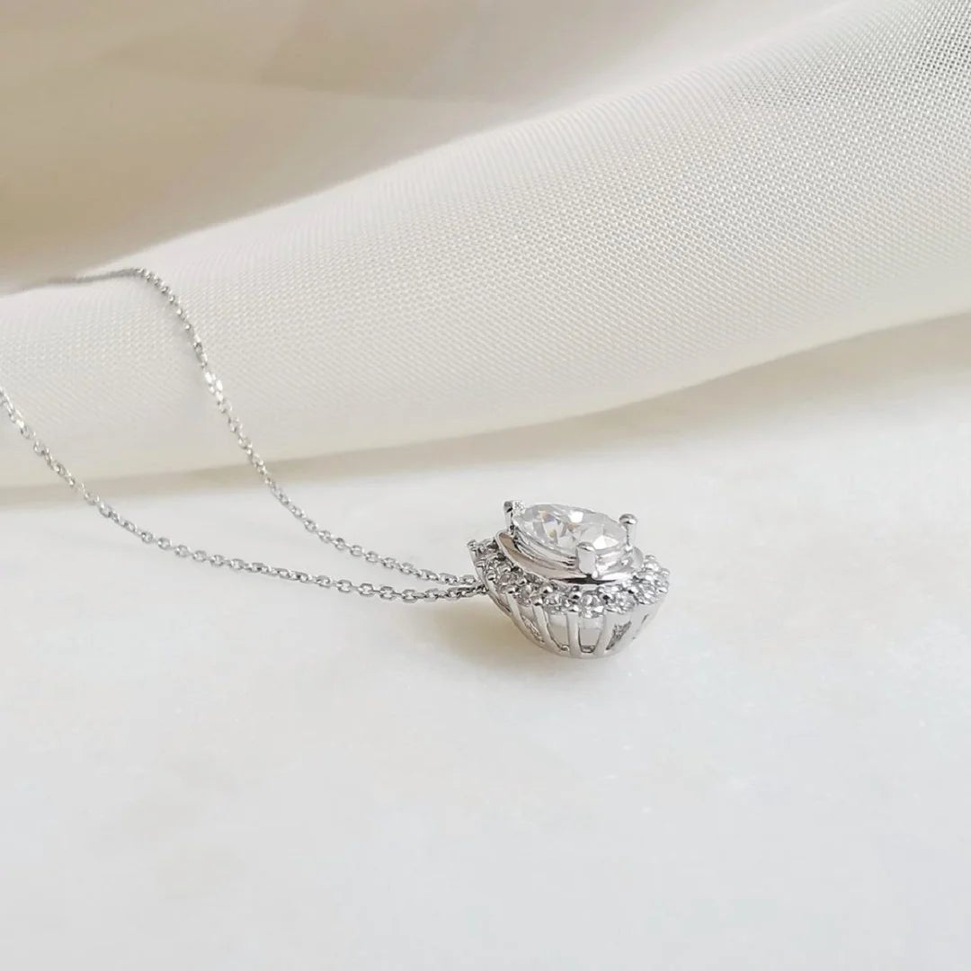 Halo Pear Shaped Moissanite Pendant In 14K Gold - Riant Fine Jewelry