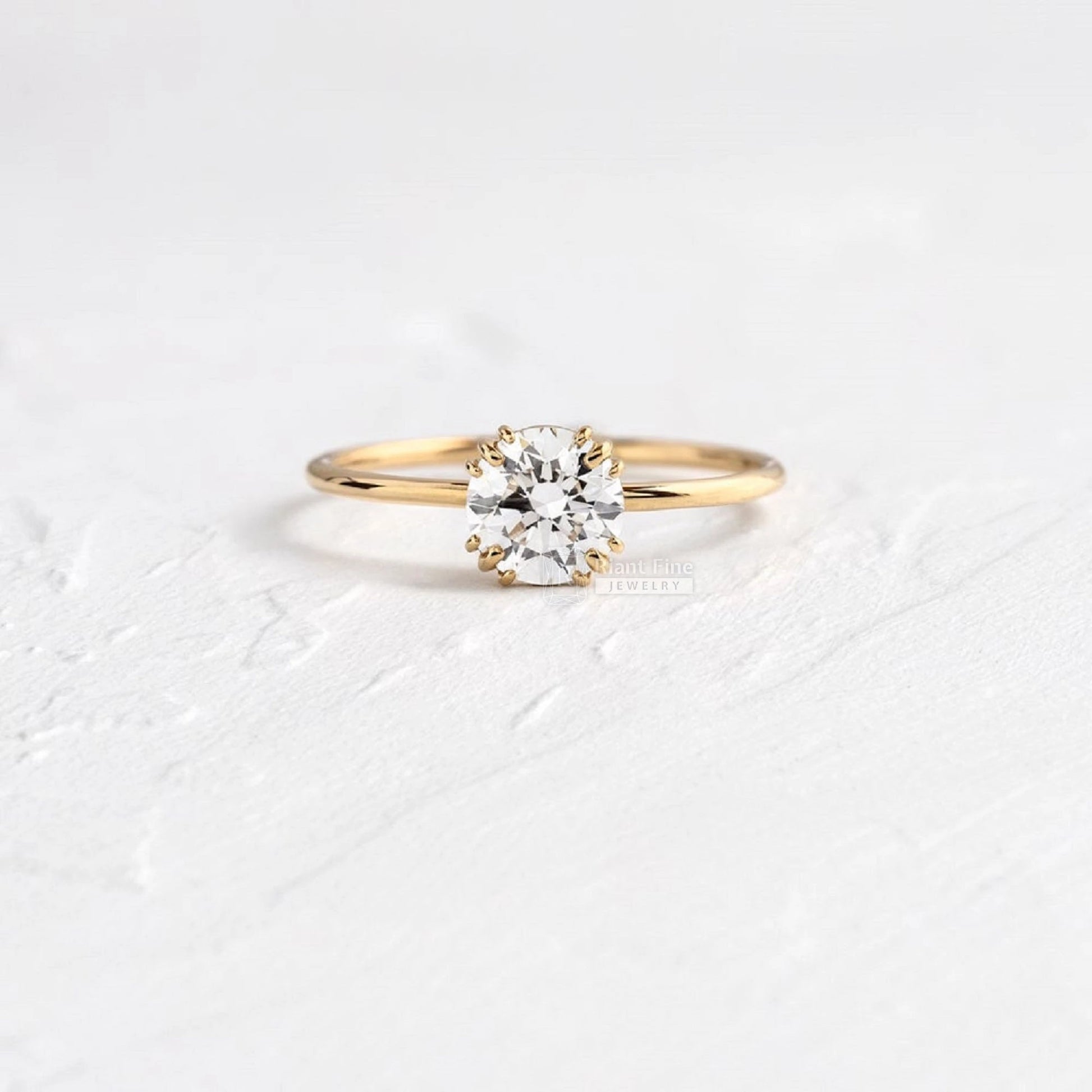 round lab grown diamond engagement ring in yellow gold