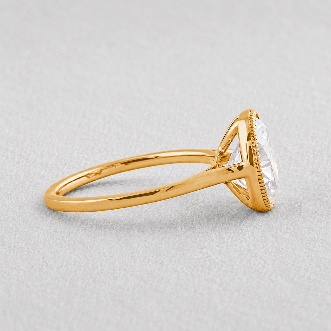 Yellow Gold Oval Bezel Engagement Ring Side View