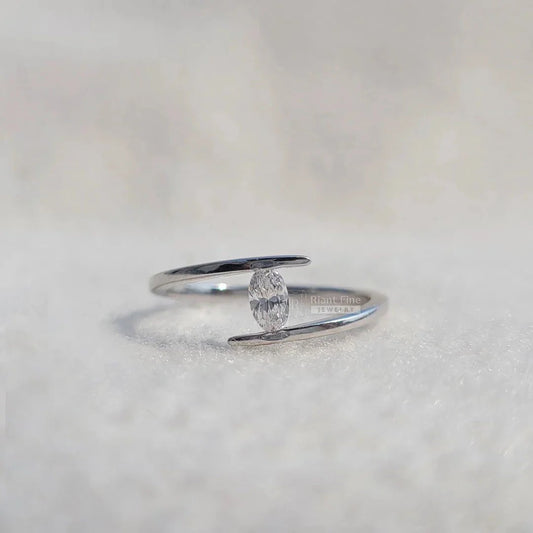 Tension Set Oval Diamond Engagement Ring In 14K Gold - Riant Fine Jewelry