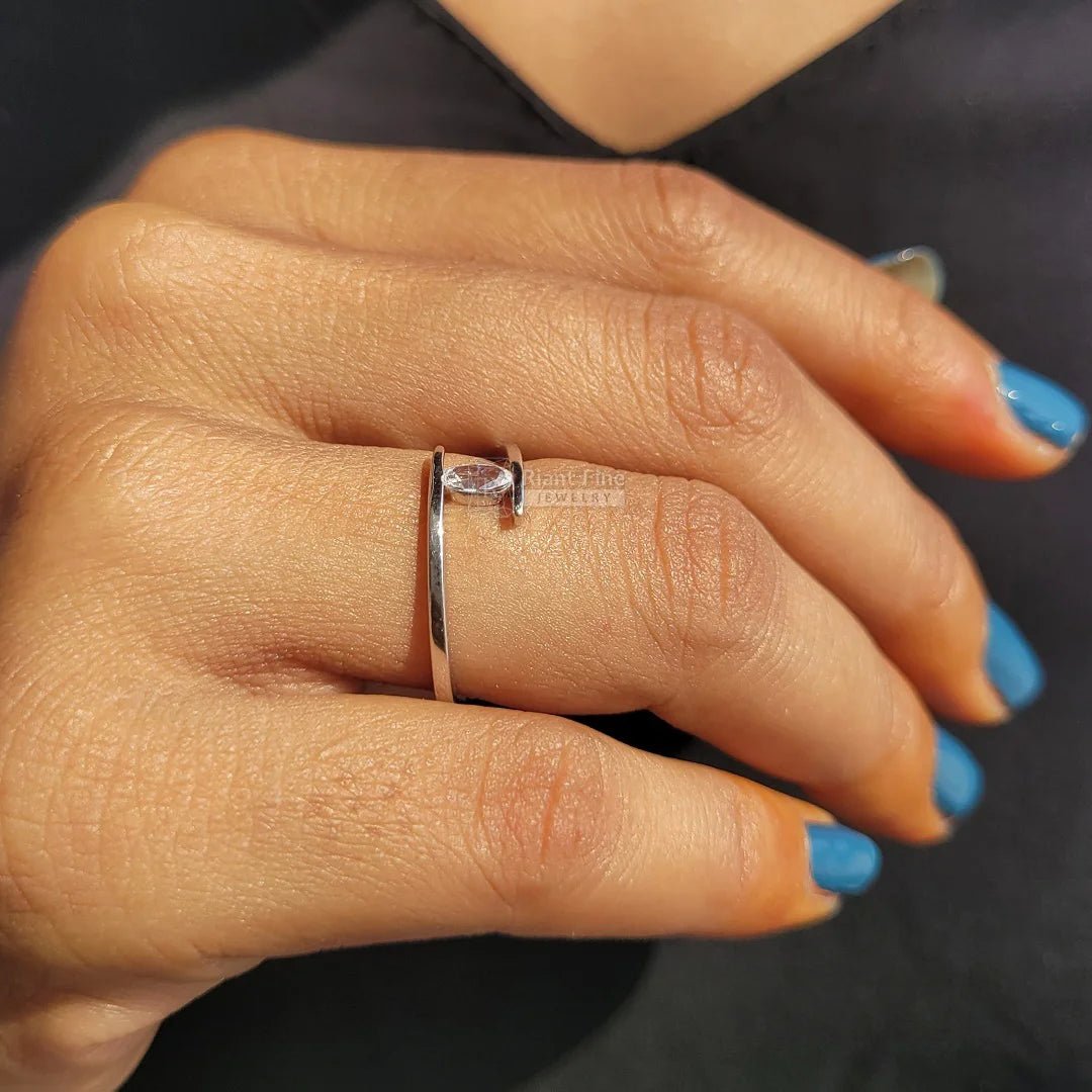 Tension Set Oval Diamond Engagement Ring In 14K Gold - Riant Fine Jewelry